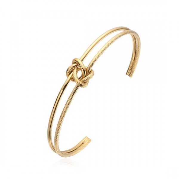 Ατσάλινο επίχρυσο βραχιόλι-χειροπέδα με κόμπο 