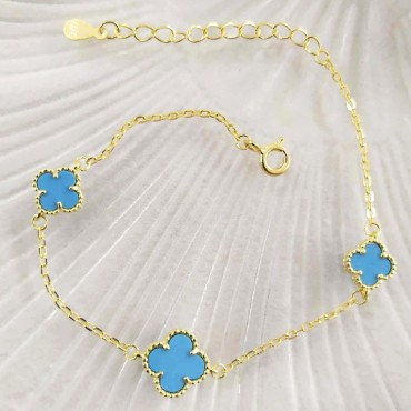 Ασημένιο και επιχρυσωμένο βραχιόλι με τρεις σταυρούς από πέτρες τιρκουάζ 